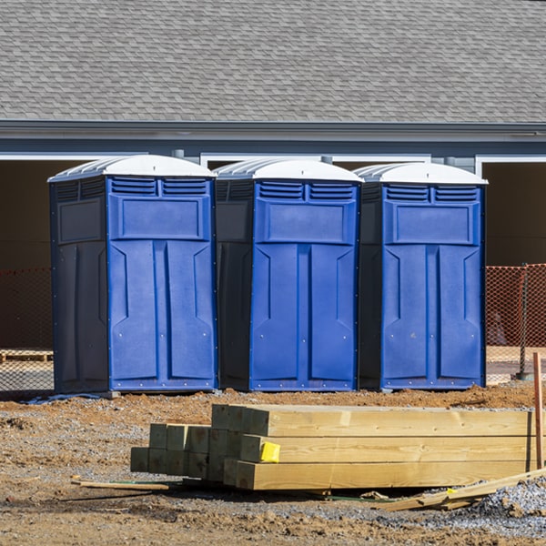 what is the cost difference between standard and deluxe portable restroom rentals in Baskerville Virginia